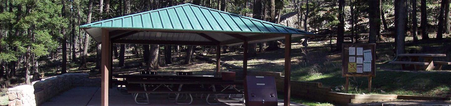 Ramada with additional picnic tables at Aspen Group Campground